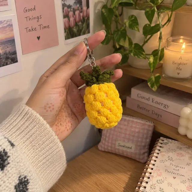 Crochet Pineapple Keychain — Yellow, held in a hand indoors, handmade by Felofey