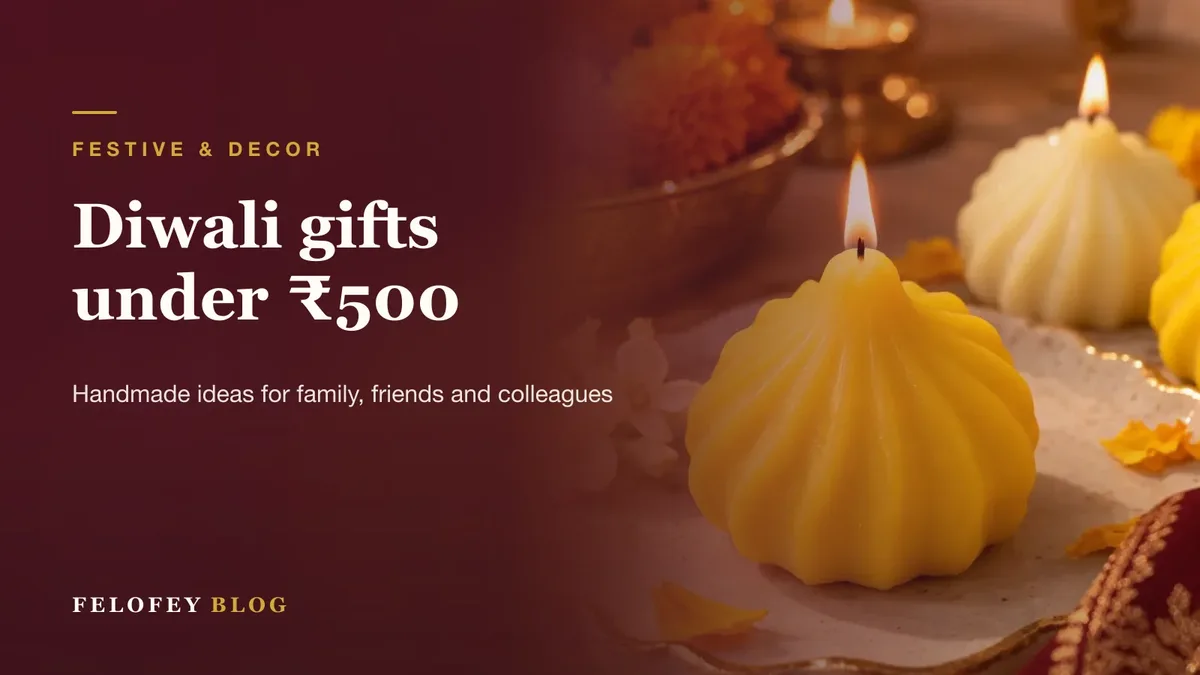 Diwali gifts under ₹500: modak candles lit on a thali with marigolds