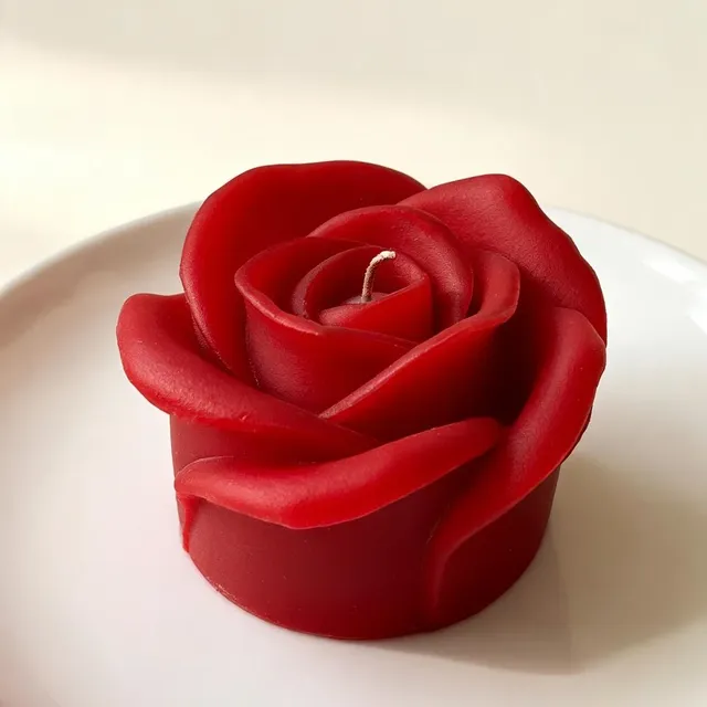 Red rose candle on a white plate, handmade by Felofey